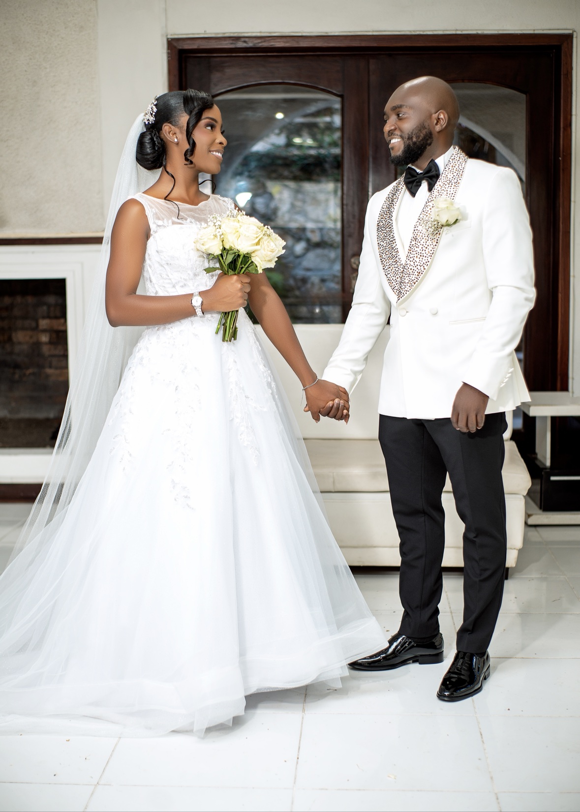 Wedding couple holding hands